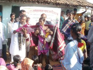 Clothes and blankets distribution program to poor Baiga children in village Bori (Lalbarra), district Balaghat (MP).