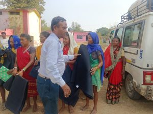 Tathagata Foundation distributed blankets to tribal families and school dresses to children.