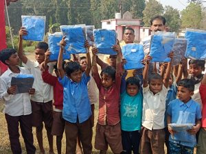 Tathagata Foundation distributed blankets to tribal families and school dresses to children.