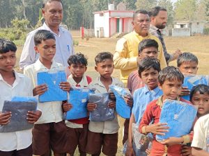 Tathagata Foundation distributed blankets to tribal families and school dresses to children.