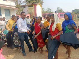 Tathagata Foundation distributed blankets to tribal families and school dresses to children.