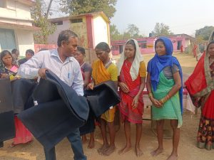 Tathagata Foundation distributed blankets to tribal families and school dresses to children.